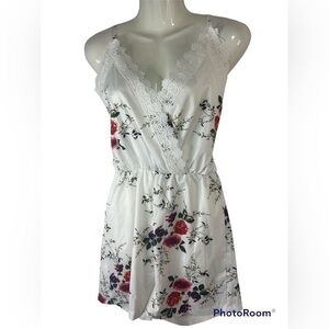 Floral rompers, brand unknown. Size small.